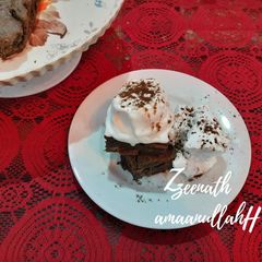 A picture of Cadbury Chocolate Brownies with Vanilla Ice-cream.