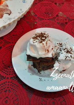 A picture of Cadbury Chocolate Brownies with Vanilla Ice-cream.
