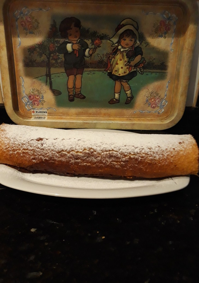 Una foto de Brazo gitano relleno de chocolate