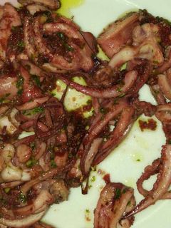 Una foto de Calamares al ajillo con coñac