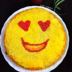 A picture of Emoji Eggless Mango Cake.