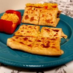 A picture of Mughlai Egg Paratha.