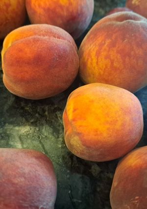 A picture of Canned fresh peaches.