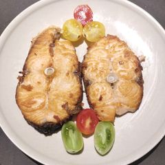 A picture of Pan-Seared Salmon with Cherry Tomatoes.