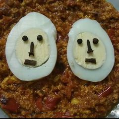 A picture of Egg curry with Egg bhurji masala.