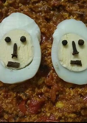 A picture of Egg curry with Egg bhurji masala.