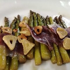 A picture of Sauteed Asparagus with Jamon.