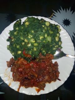 A picture of Mukimo with wet fried beef.