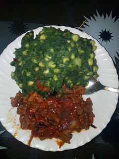 A picture of Mukimo with wet fried beef.