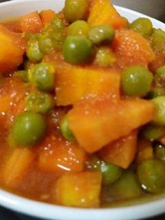 A picture of Carrots and peas stew.