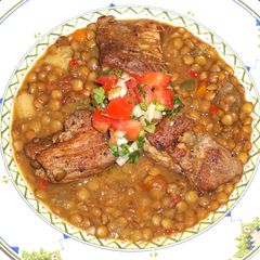 A picture of Cajun pork spare ribs and lentils.