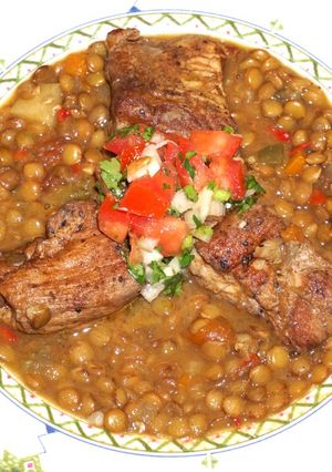 A picture of Cajun pork spare ribs and lentils.
