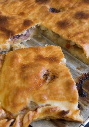 Foto principal de Empanada rápida de zamburiñas y cerezas pasas