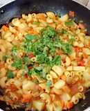 Guiso vegetariano de papas y fideos