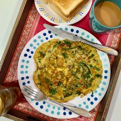 10 mins Hara lehsan Omelette (green garlic omelette) A picture of 10 mins Hara lehsan Omelette (green garlic omelette).