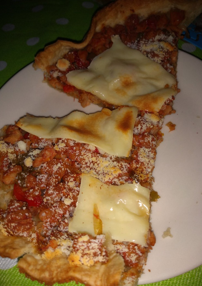 Una foto de Pizza de soja texturizada queso y aceitunas