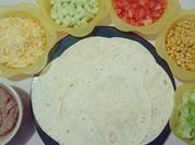 Una foto de relleno de tortillas maiz