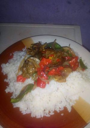 A picture of White rice with sauce.