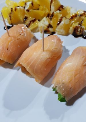 Foto di Involtini di Salmone affumicato con rucola e philadelphia