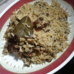 A picture of Jollof rice n beans.