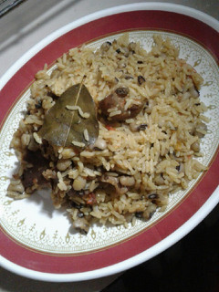 A picture of Jollof rice n beans.