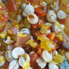 Una foto de Caracoles en salsa
