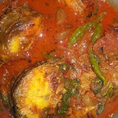 A picture of Rohu fish curry.