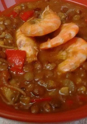 Una foto de Lentejas con langostinos