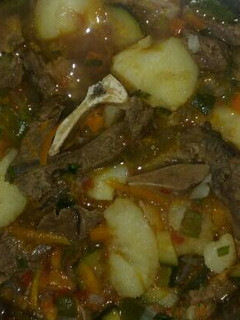 A picture of Beef stew with potatoes.