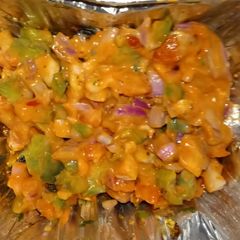A picture of Onion and capsicum veg.