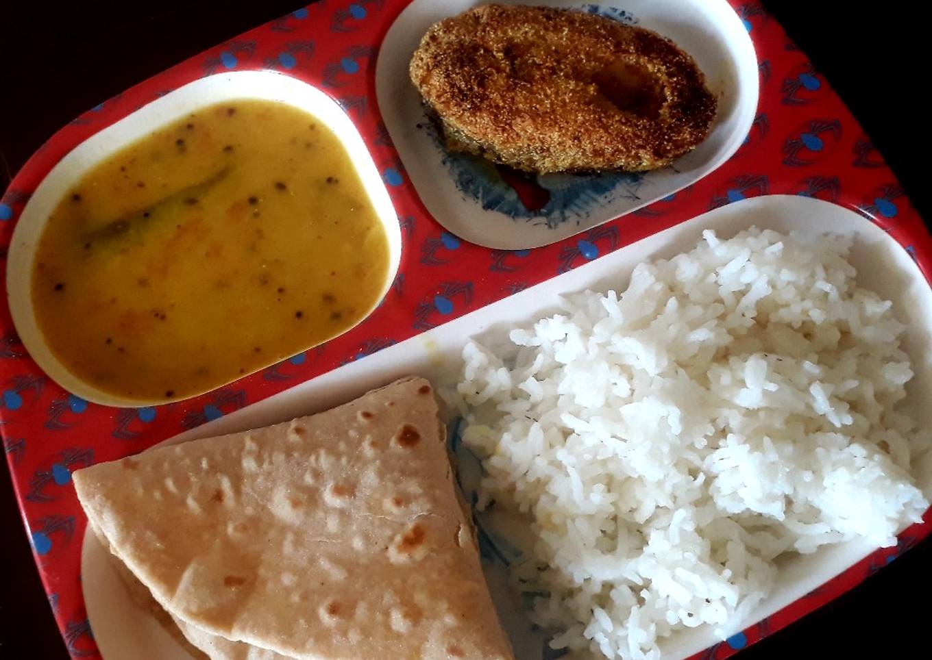 Dal, rice, with fish fry and roti