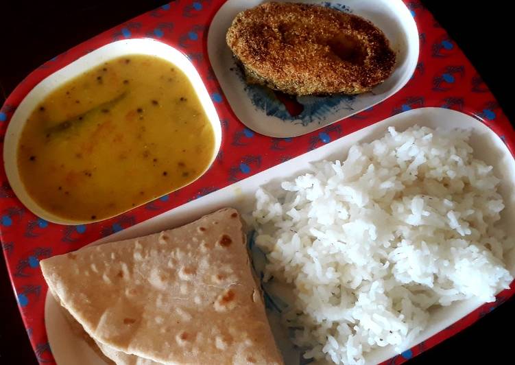 Dal, rice, with fish fry and roti