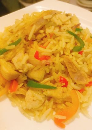 A picture of Chicken stirred fried rice.