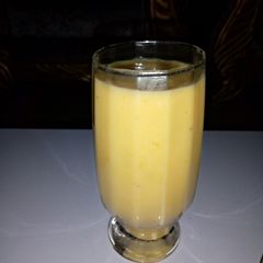A picture of Mango,banana & orange smoothy.