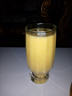 A picture of Mango,banana & orange smoothy.