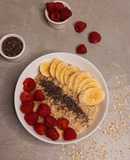 Apple cinnamon oatmeal topped with oatmeal with Raspberry chia