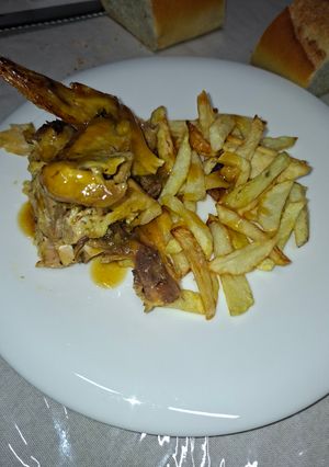 Una foto de Pollo asado con naranja