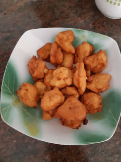 Una foto de Buñuelos de manzana con miel