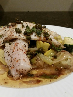 A picture of Brad's keto friendly walleye w/ basil caper browned butter sauce.