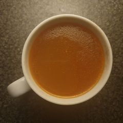 A picture of Spicy Chilli Tomato Chicken Rice Soup.