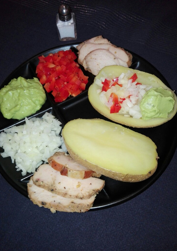 Una foto de Patatas al horno rellenas