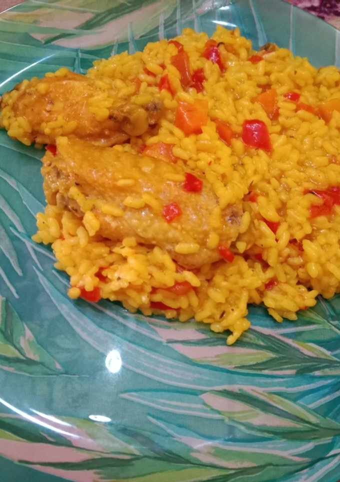 Una foto de Arroz a la cerveza con alitas de pollo