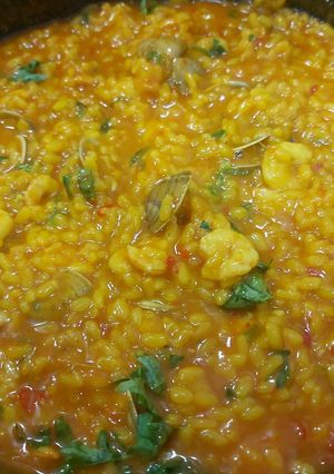Foto principal de Arroz caldoso con gambas y almejas