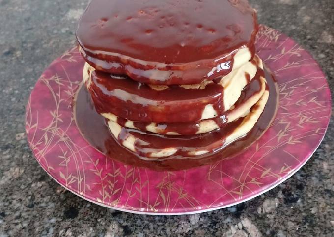 Fluffy pancakes with chocolate syrup