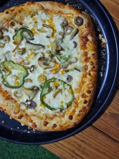 صورة لوصفة بيتزا بعجينه طريه جداً