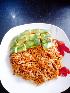 A picture of Avacado and Jellof Rice.