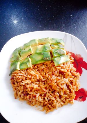 A picture of Avacado and Jellof Rice.