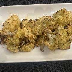 A picture of Baked Caramelized Cauliflower - wow so simple and amazing - the Kids love it - enjoy :P.