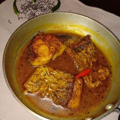 Fish curry A picture of Fish curry.
