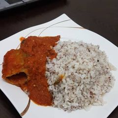 A picture of Local rice and pepper stew.